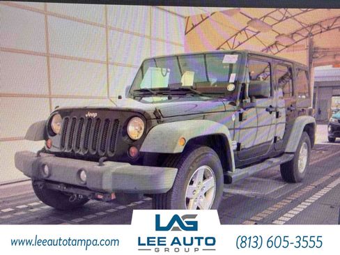 Used 2012 Jeep Wrangler Unlimited Sport AWD/4WD image 1