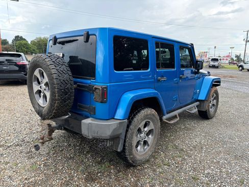 Used 2014 Jeep Wrangler Unlimited Sahara AWD/4WD image 4