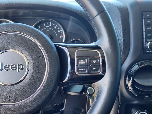 Used 2014 Jeep Wrangler Unlimited Sahara AWD/4WD image 16