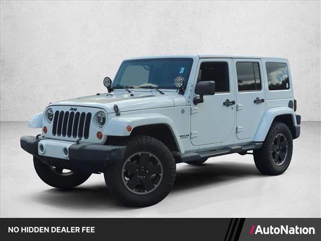 Used 2012 Jeep Wrangler Unlimited Sahara AWD/4WD image 1