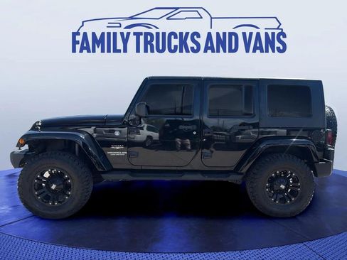 Used 2010 Jeep Wrangler Unlimited Sahara w/ Limited Group AWD/4WD image 2