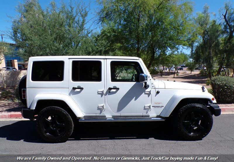 Used 2012 Jeep Wrangler Unlimited Sahara w/ Dual Top Group AWD/4WD image 7