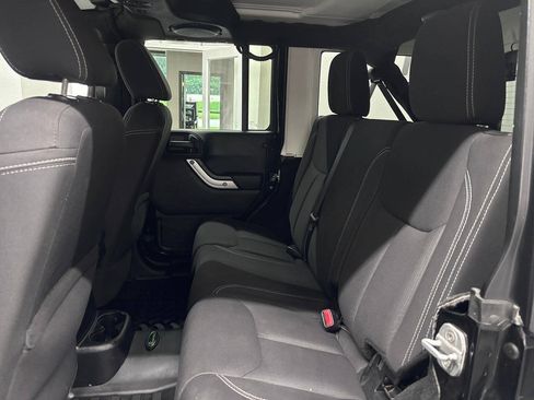 Used 2013 Jeep Wrangler Unlimited Sahara w/ Dual Top Group AWD/4WD image 17