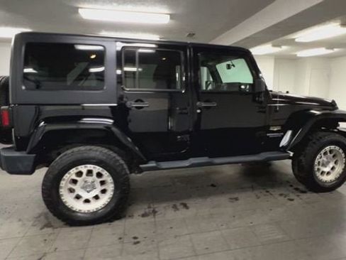 Used 2014 Jeep Wrangler Unlimited Sahara w/ Dual Top Group image 9