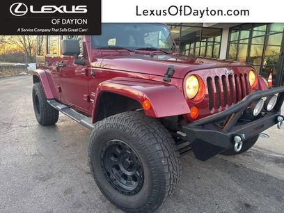Used 2011 Jeep Wrangler Unlimited Sahara w/ Dual Top Group