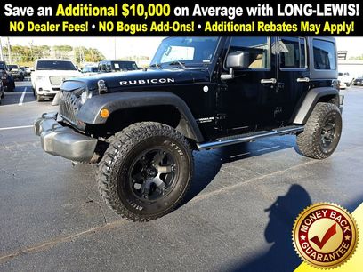 Used 2011 Jeep Wrangler Unlimited Rubicon w/ Dual Top Group