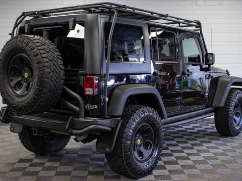 Used 2013 Jeep Wrangler Unlimited Rubicon w/ Dual Top Group AWD/4WD image 3