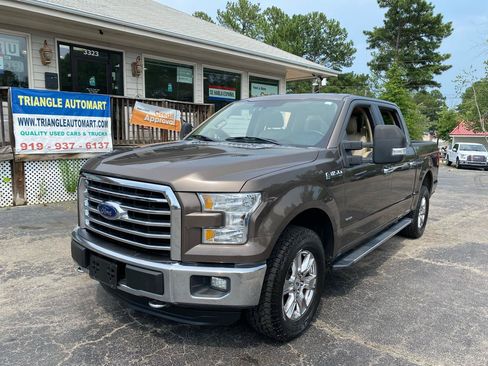 Used 2015 Ford F150 XLT w/ Equipment Group 302A Luxury AWD/4WD image 1