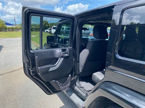 Used 2012 Jeep Wrangler Unlimited Sahara w/ Dual Top Group AWD/4WD image 15