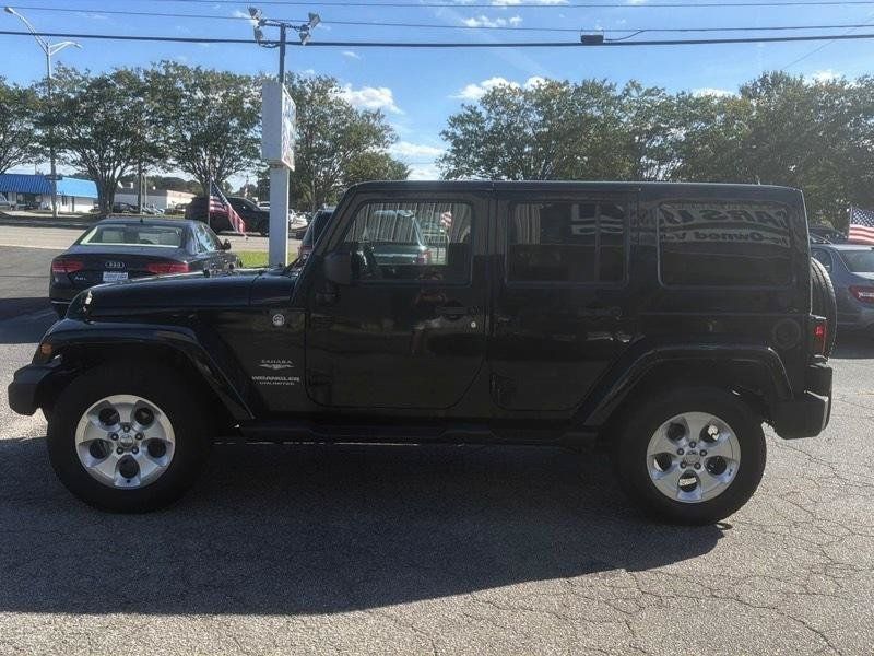 Used 2014 Jeep Wrangler Unlimited Sahara w/ Dual Top Group AWD/4WD image 5