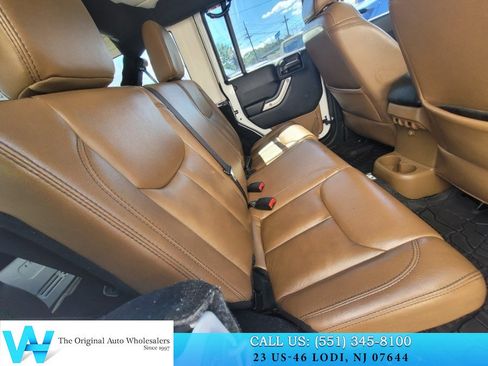 Used 2014 Jeep Wrangler Unlimited Sahara w/ Dual Top Group AWD/4WD image 22