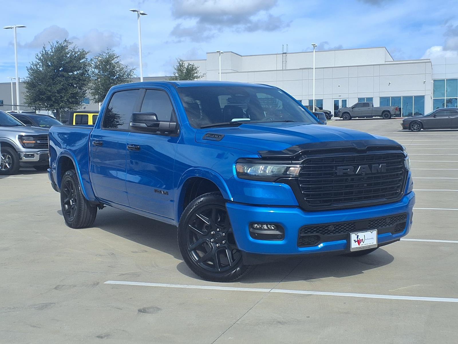 Used 2025 RAM 1500 Laramie w/ Night Edition AWD/4WD image 1
