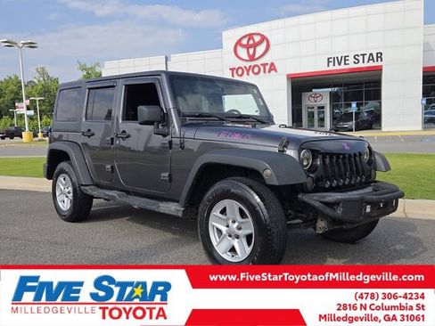 Used 2014 Jeep Wrangler Unlimited Sport AWD/4WD image 1