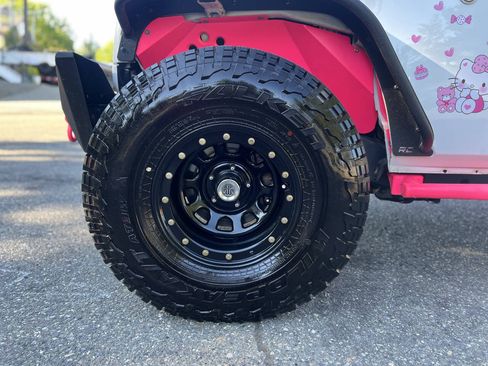 Used 2012 Jeep Wrangler Unlimited Sport AWD/4WD image 24