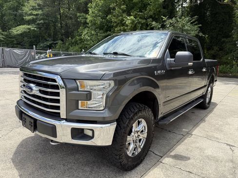 Used 2015 Ford F150 XLT w/ Equipment Group 302A Luxury AWD/4WD image 1