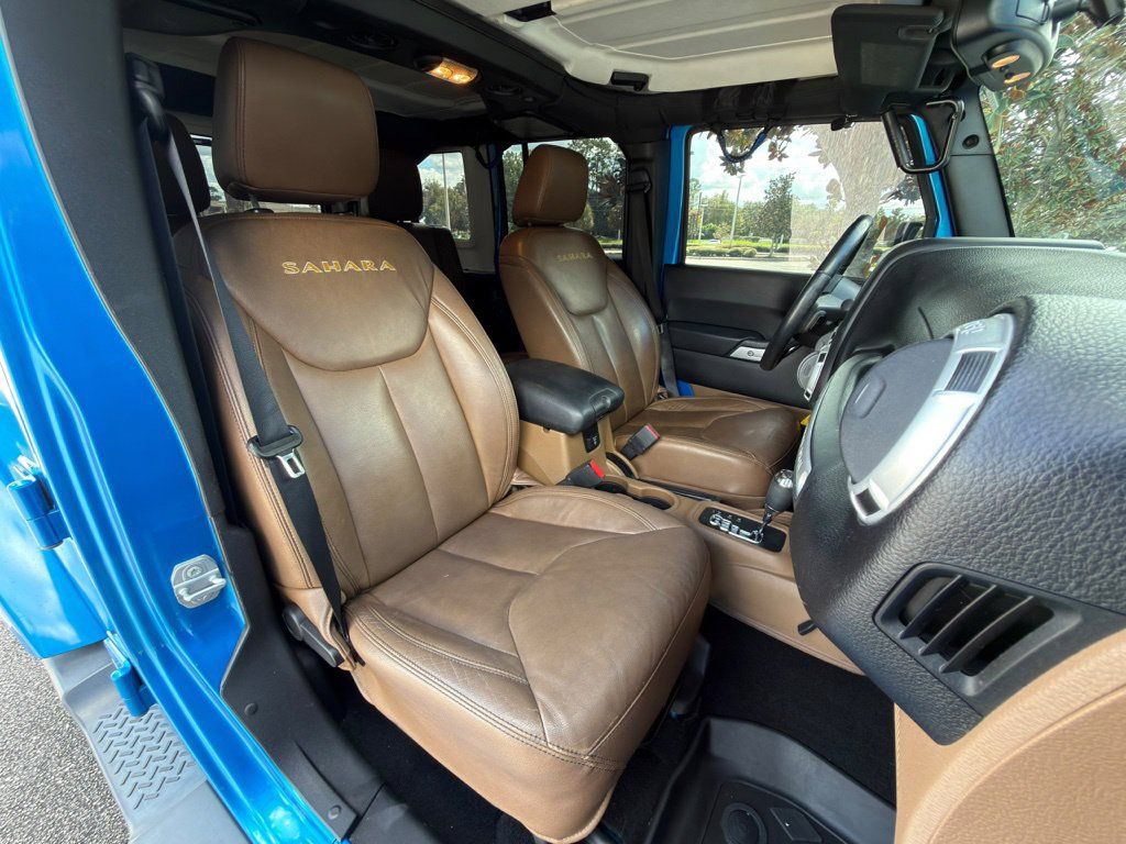 Used 2015 Jeep Wrangler Unlimited Sahara w/ Dual Top Group AWD/4WD image 25