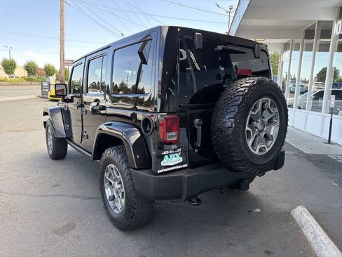 Used 2015 Jeep Wrangler Unlimited Rubicon w/ Dual Top Group AWD/4WD image 4
