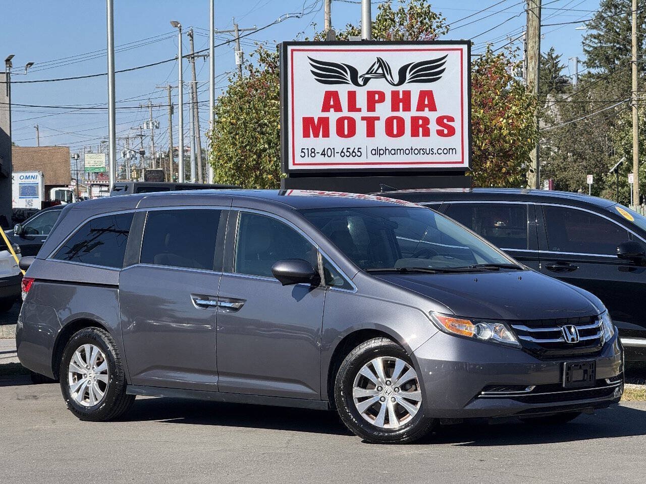 Used 2014 Honda Odyssey EX image 1