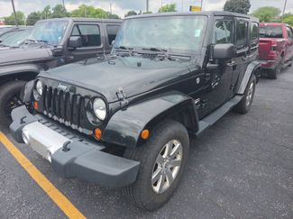 Used 2013 Jeep Wrangler Unlimited Sahara w/ Dual Top Group AWD/4WD video 1