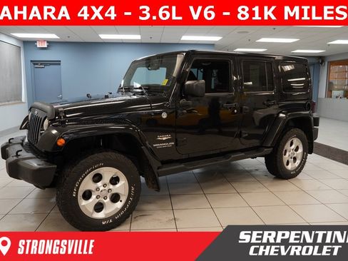 Used 2014 Jeep Wrangler Unlimited Sahara w/ Dual Top Group image 1