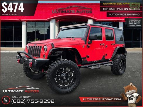 Used 2013 Jeep Wrangler Unlimited Sahara AWD/4WD image 2