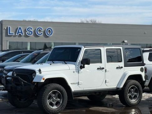 Used 2012 Jeep Wrangler Unlimited Sahara w/ Dual Top Group image 1