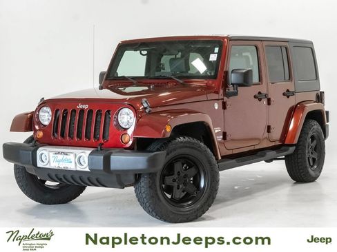 Used 2010 Jeep Wrangler Unlimited Sahara w/ Trailer Tow Group AWD/4WD image 1
