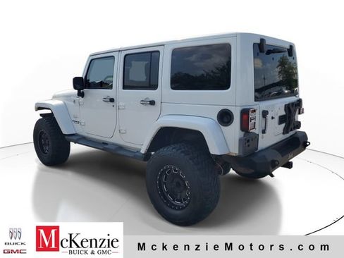 Used 2013 Jeep Wrangler Unlimited Sahara w/ Dual Top Group AWD/4WD image 3
