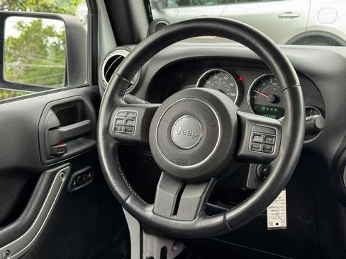Used 2014 Jeep Wrangler Unlimited Rubicon w/ Dual Top Group AWD/4WD image 12