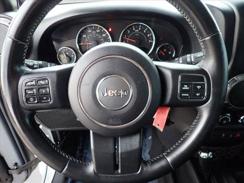 Used 2013 Jeep Wrangler Unlimited Sport w/ Mopar Black Appearance Group AWD/4WD image 12