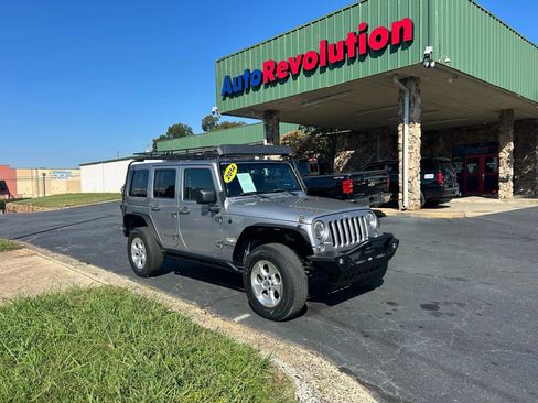 Used 2014 Jeep Wrangler Unlimited Sahara w/ Dual Top Group image 1