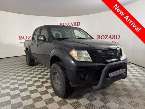 Used 2011 Nissan Frontier PRO-4X image 1