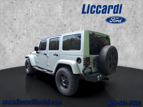 Used 2012 Jeep Wrangler Unlimited Sahara w/ Dual Top Group AWD/4WD image 4