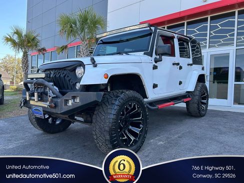 Used 2017 Jeep Wrangler Unlimited Sahara w/ Dual Top Group image 1
