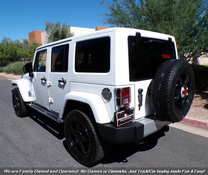 Used 2012 Jeep Wrangler Unlimited Sahara w/ Dual Top Group AWD/4WD image 6