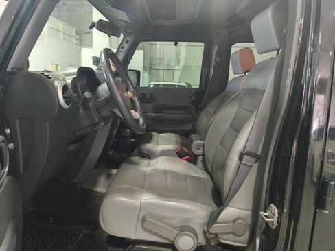 Used 2010 Jeep Wrangler Unlimited Sahara w/ Dual Top Group AWD/4WD image 9