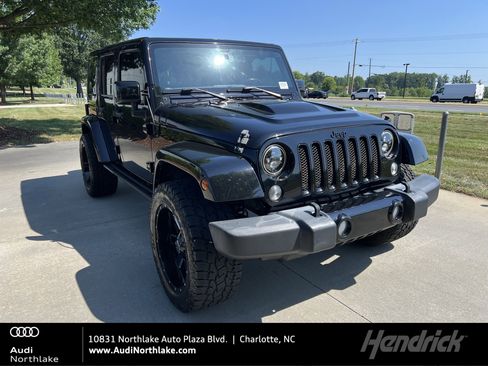 Used 2015 Jeep Wrangler Unlimited Sahara AWD/4WD image 1