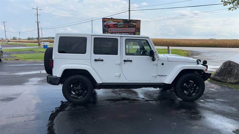 Used 2015 Jeep Wrangler Unlimited Sahara AWD/4WD image 1