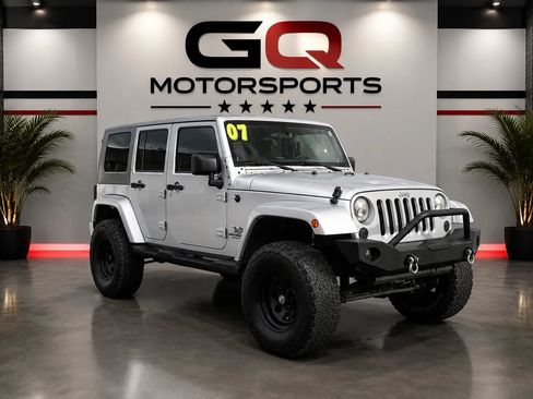 Used 2007 Jeep Wrangler Unlimited Sahara w/ Dual Top Group AWD/4WD image 1