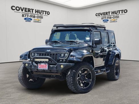Used 2015 Jeep Wrangler Unlimited Sahara AWD/4WD image 1