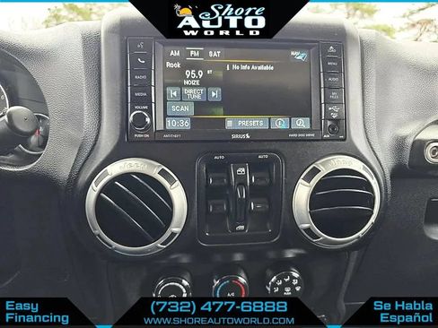 Used 2014 Jeep Wrangler Unlimited Sahara w/ Dual Top Group AWD/4WD image 13