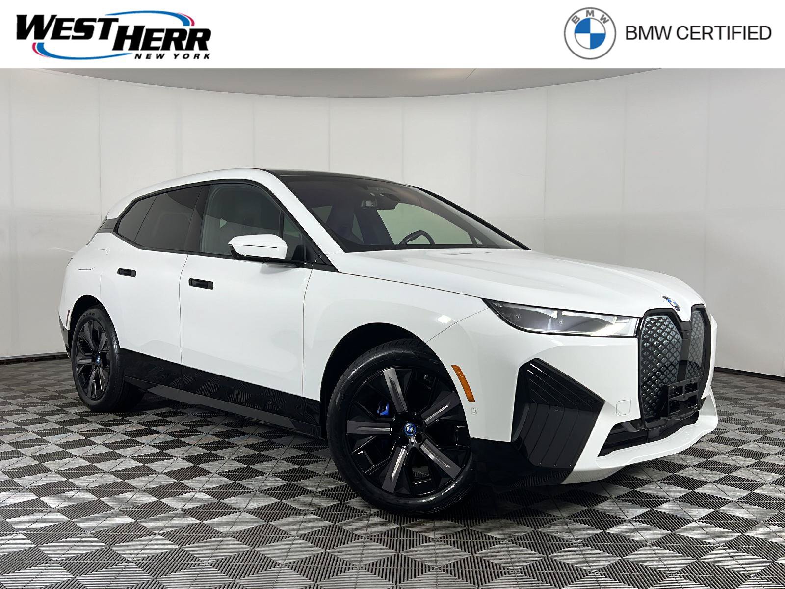 Used 2024 BMW iX xDrive50 w/ Premium Package AWD/4WD image 1