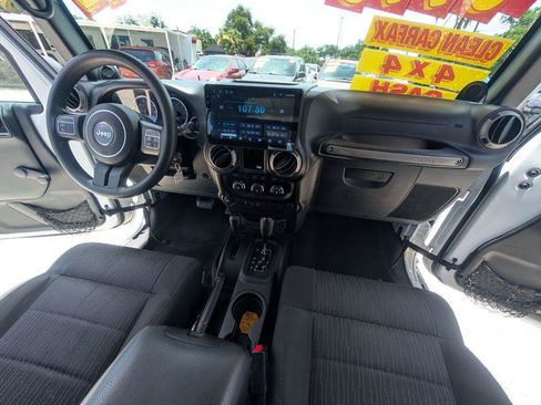 Used 2012 Jeep Wrangler Unlimited Sport w/ Max Tow Pkg AWD/4WD image 14