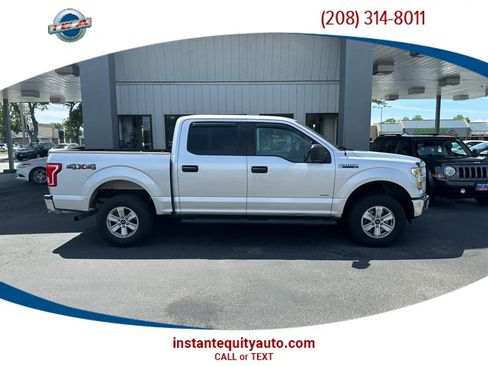 Used 2015 Ford F150 XLT AWD/4WD image 1