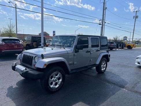 Used 2013 Jeep Wrangler Unlimited Sahara w/ Dual Top Group AWD/4WD image 2