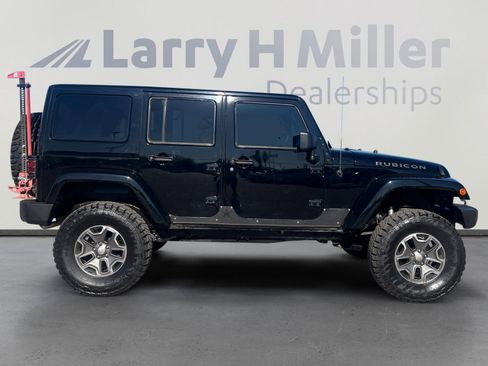 Used 2013 Jeep Wrangler Unlimited Rubicon w/ Dual Top Group AWD/4WD image 6