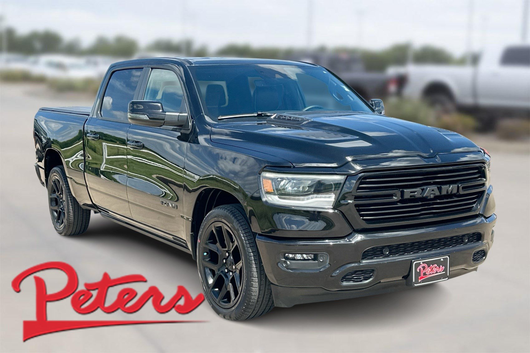 Used 2023 RAM 1500 Laramie AWD/4WD image 1