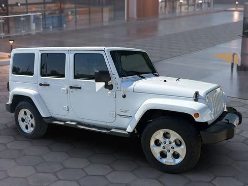 Used 2015 Jeep Wrangler Unlimited Sahara w/ Mopar Chrome Edition Group AWD/4WD image 19