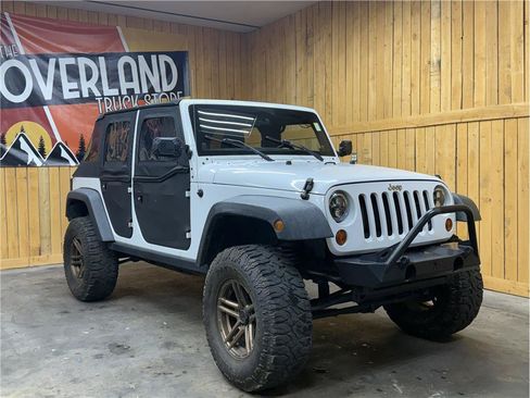 Used 2012 Jeep Wrangler Unlimited Sport w/ Connectivity Group AWD/4WD image 1