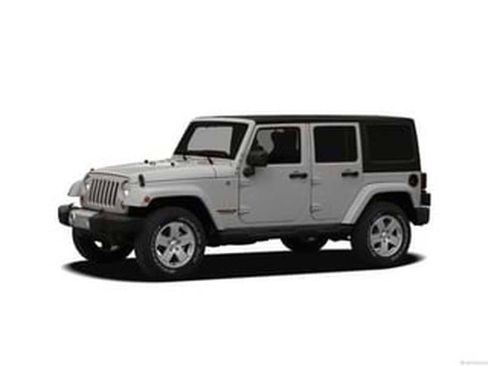 Used 2012 Jeep Wrangler Unlimited Sahara w/ Dual Top Group image 1